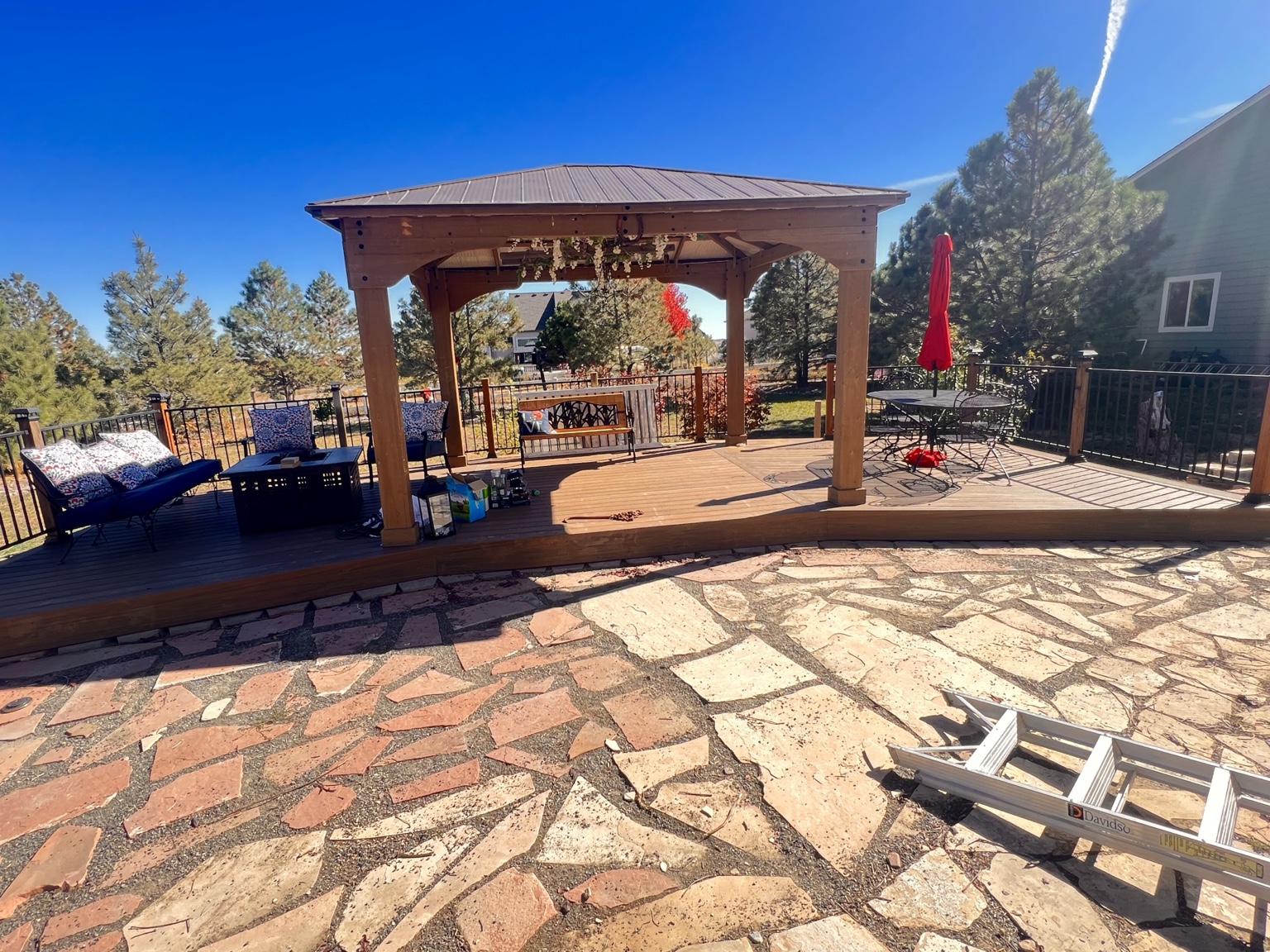 Raised wood deck with gazebo and lattice skirting