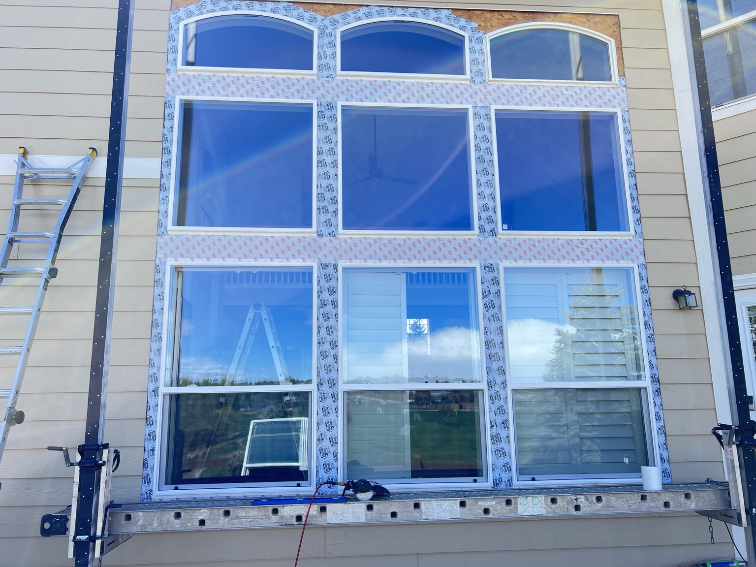 Large residential windows during installation